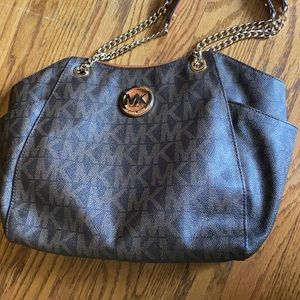 Used like new Michael kors bag leather zipper top